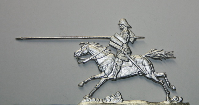 polnischer Ritter zu Pferd mit eingelegter Lanze angreifend